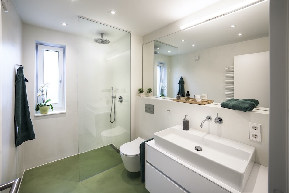Modernes Badezimmer mit nahtloser Mikrozementbeschichtung in Köln-Ehrenfeld